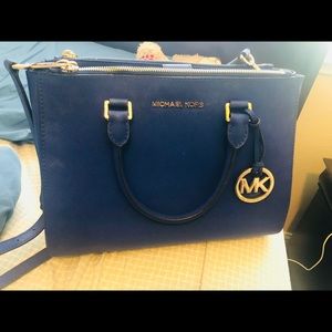 Michael kors Royal Blue crossbody (used no rips)